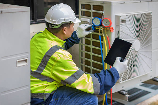 Professional Air Conditioning Repair technician working in Fate, TX